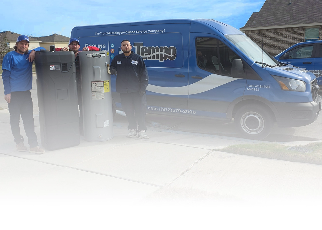 Tempo Air plumbers with two residential water heaters and a branded service van in a North Texas neighborhood.
